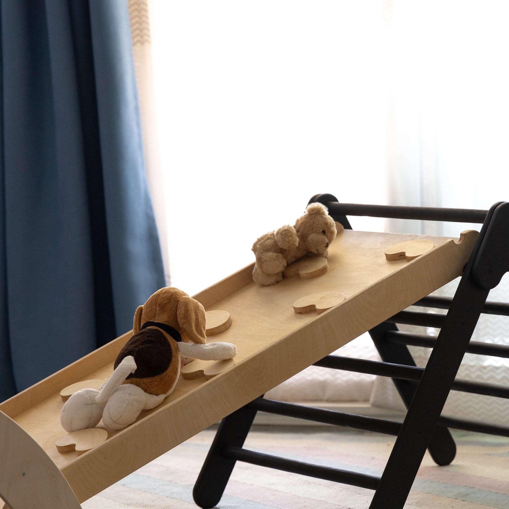 toys having fun on a climber package of wooden toys